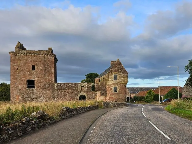 A photograph of Burleigh Castle in Milnathort. The photograph is taken from the west of Burleigh Castle, pointing in the direction of Loch Leven's Larder with the village of Milnathort behind the camera.